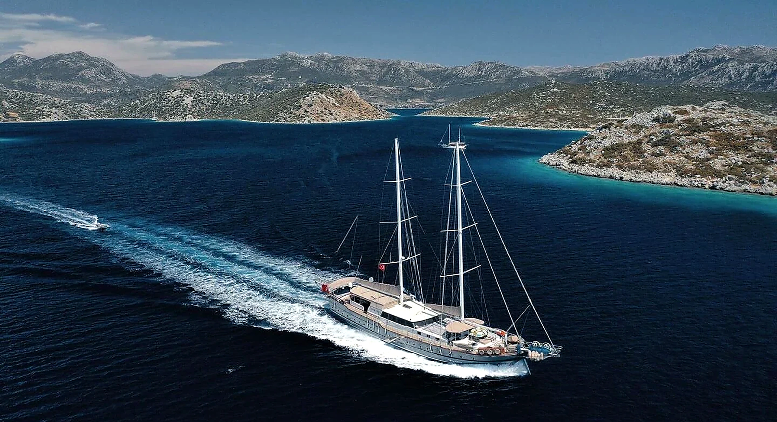 Nevra Queen 40m Luxury Gulet Charter Yacht Profile at Anchor in Bodrum Turquoise Bay in Bodrum